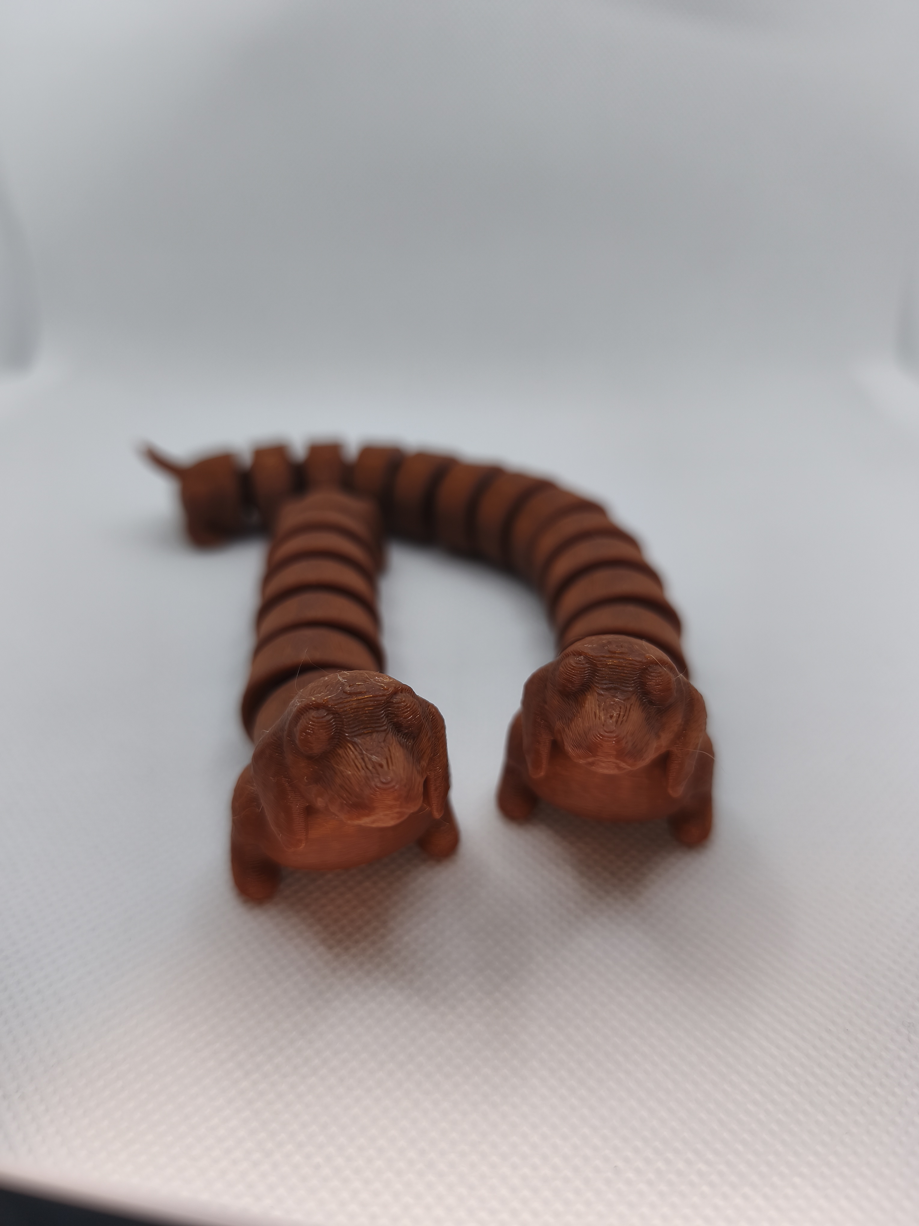 Perro salchicha articulado