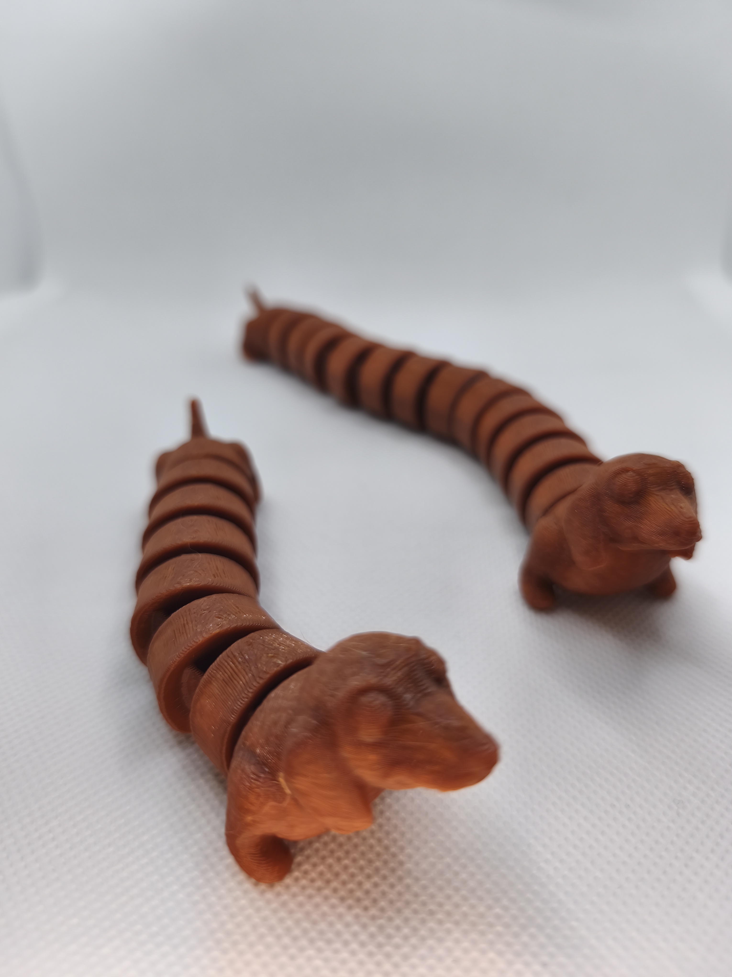 Perro salchicha articulado