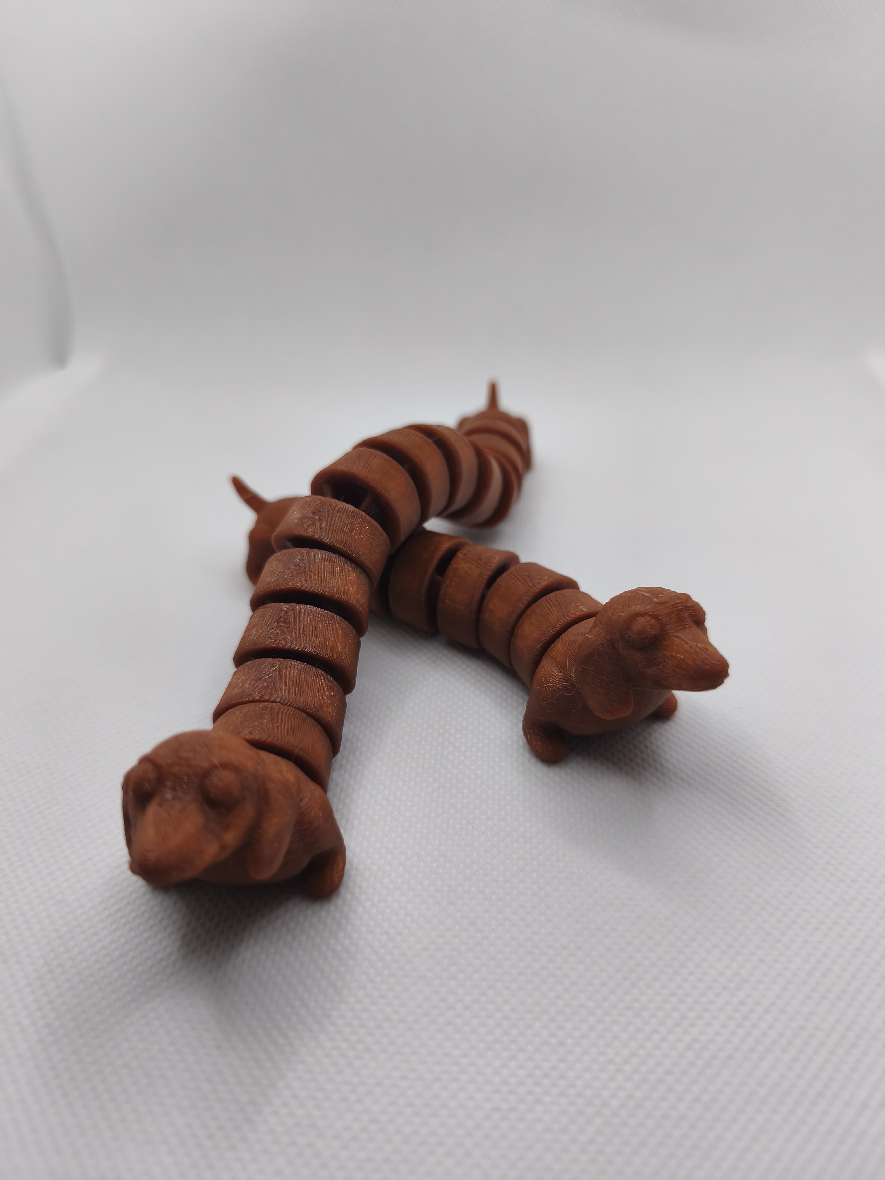 Perro salchicha articulado